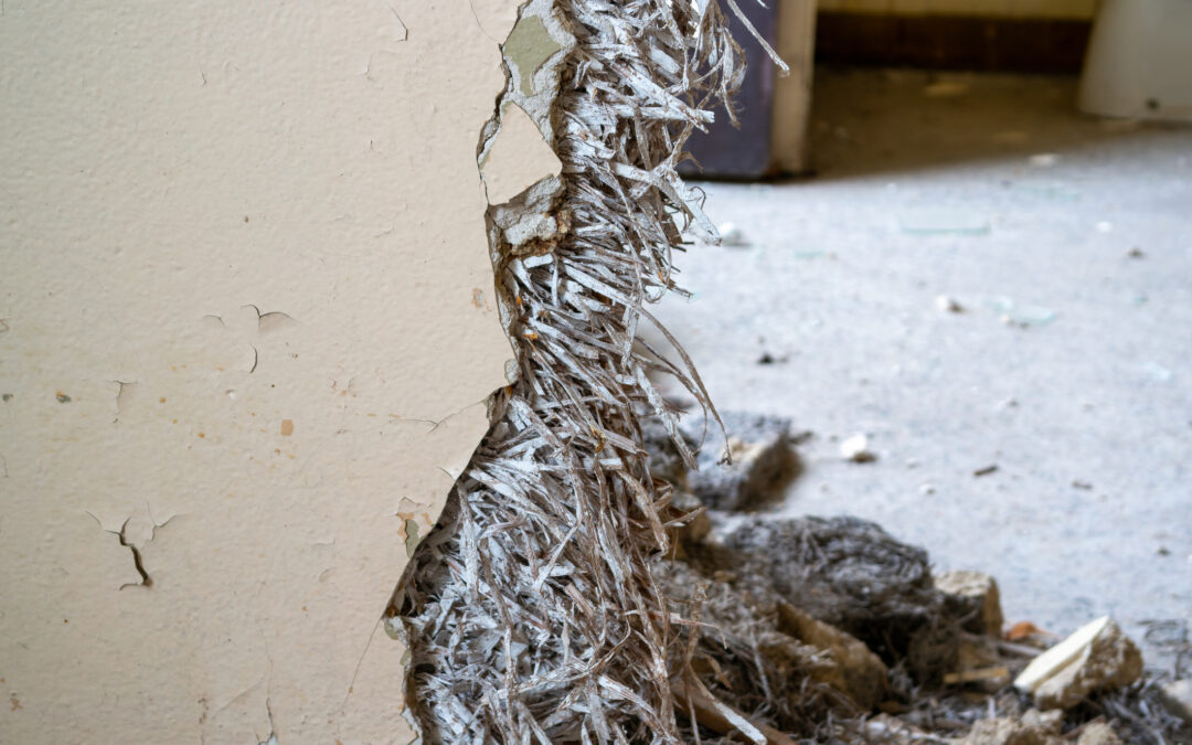 Old asbestos in a wall in the room, harmful to health