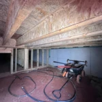 Attic space in Acworth, GA home with drying equipment set up for water damage restoration